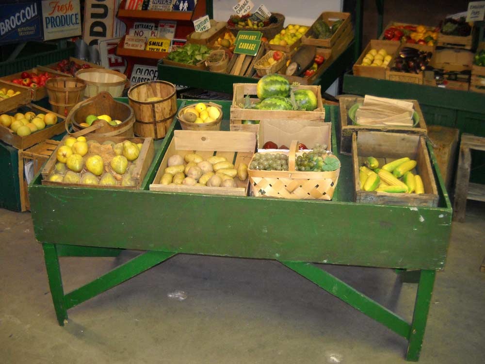 Green Wooden Produce Stands in Produce / Market